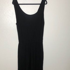 Black cotton jumpsuit with pockets.